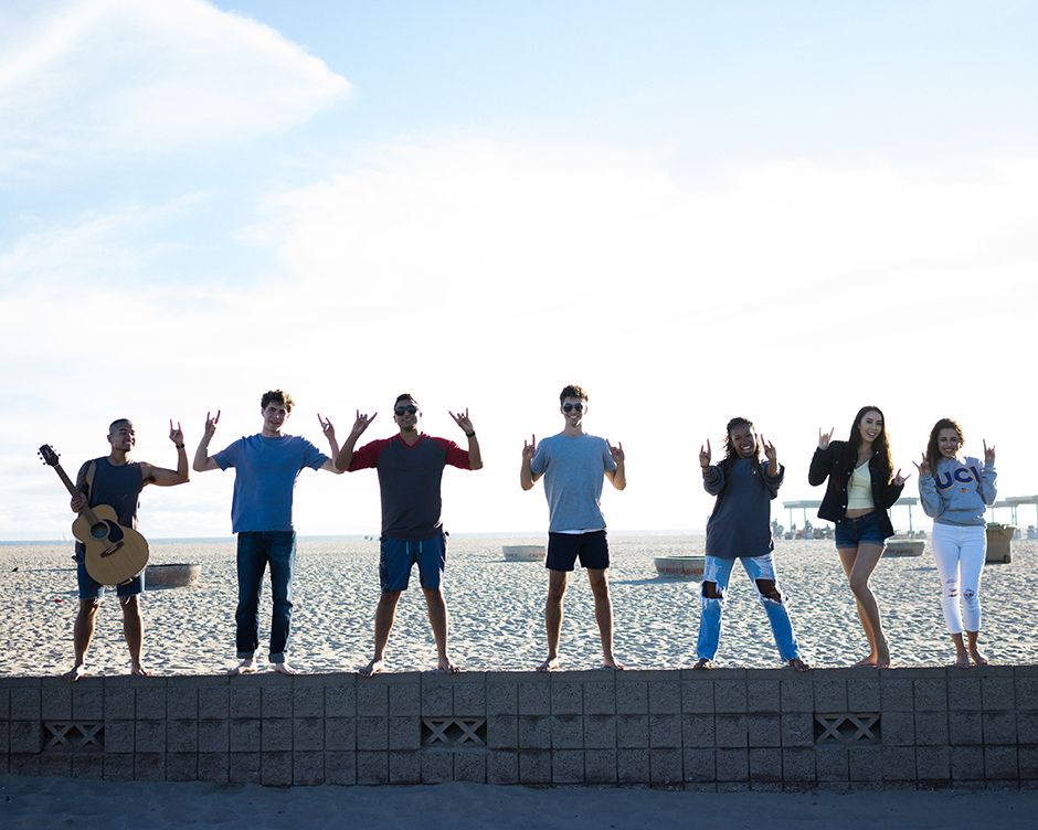 students by the beach